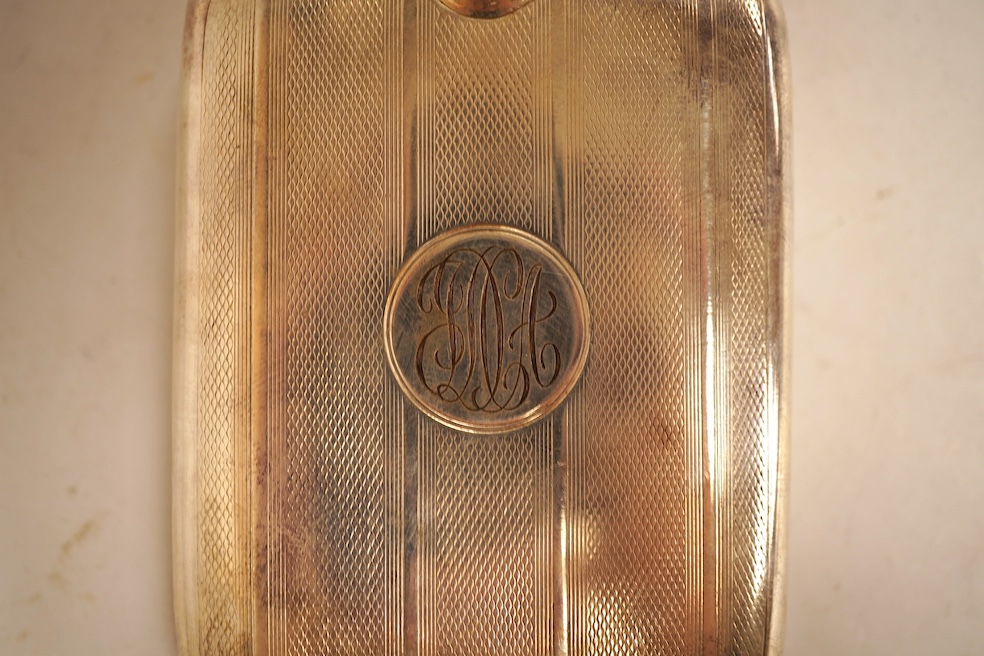 A George V engine turned silver hip flask, William Neale Ltd, Birmingham, 1924, 92mm, 89 grams.